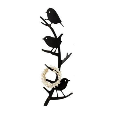Patère murale 4 crochets "Oiseaux du jardin" en métal noir